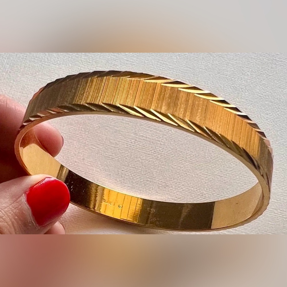Vintage Monet gold tone textured and etched edge bangle bracelet